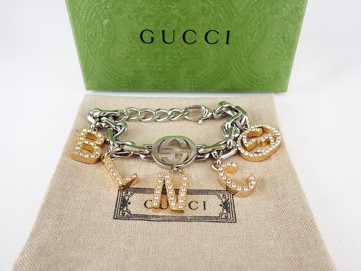 Gucci charm deals bracelet watch